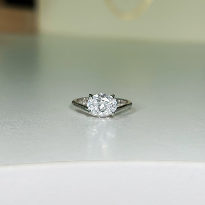 SOLITAIRE WAVE PINKY RING