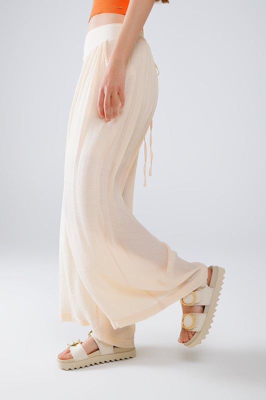Beige Palazzo style Pants With Side Pockets And Thick Waist Band - trousers